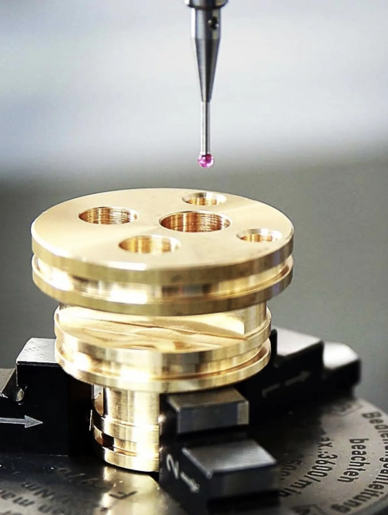 CMM coordinate measuring machine on brass part