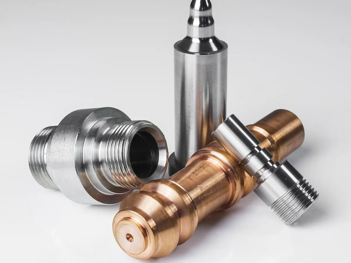 Precision CNC-turned aluminium and copper components by Brassland