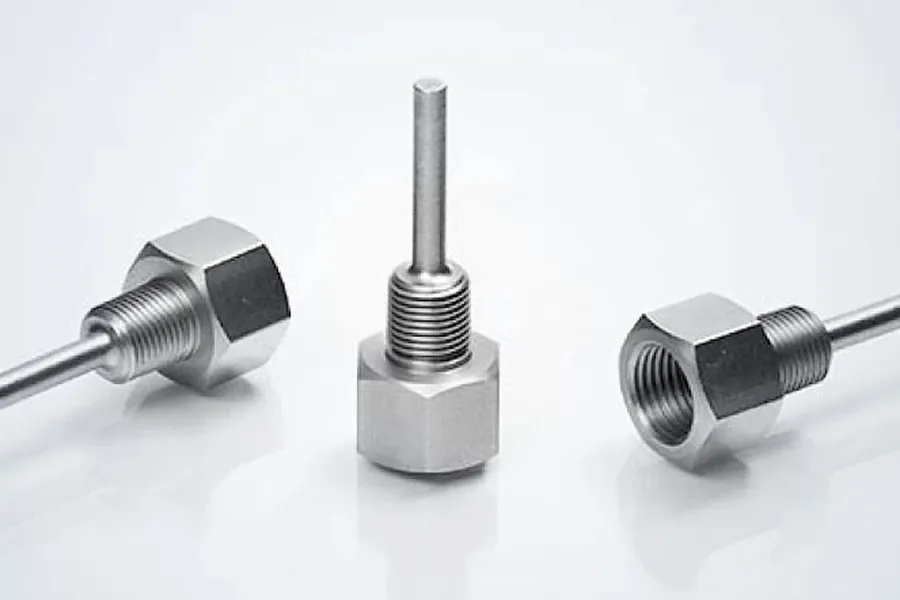 Precision turned connector and boss components