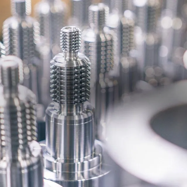 Batch of CNC turned threaded steel shafts