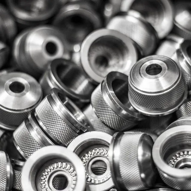 Rows of CNC knurled stainless bushes