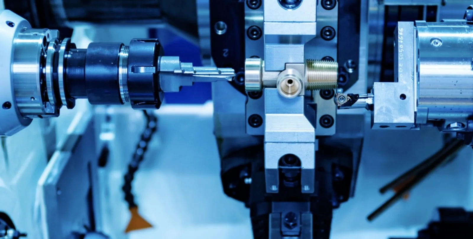 CNC machine turning a precision brass component at Brassland
