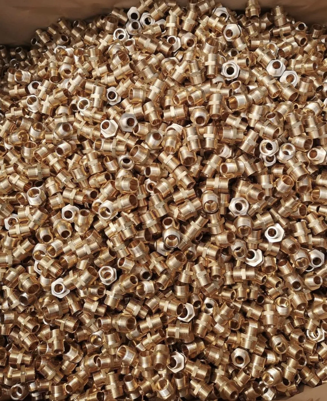 High-volume bin of machined brass components