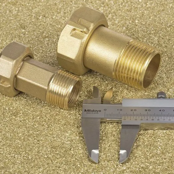 Forged brass union fittings being measured