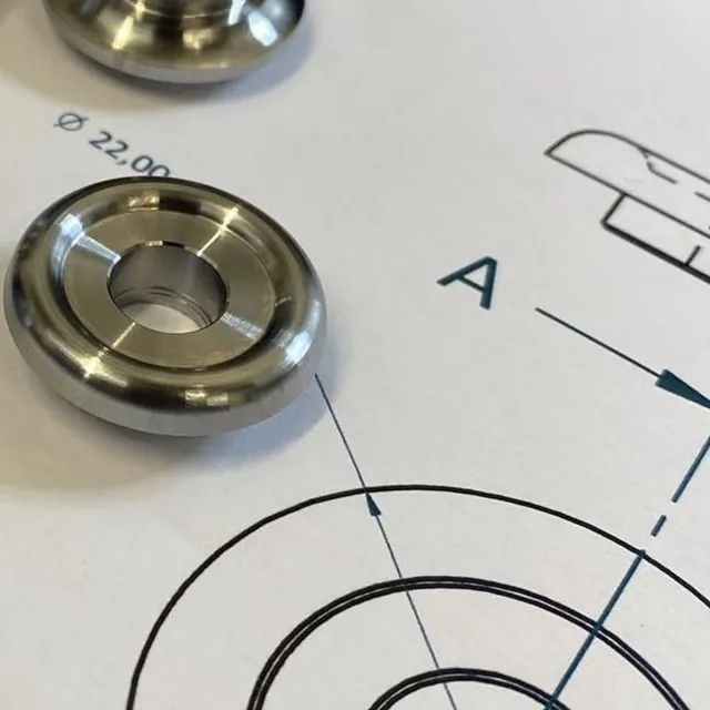 Precision turned part with engineering drawing