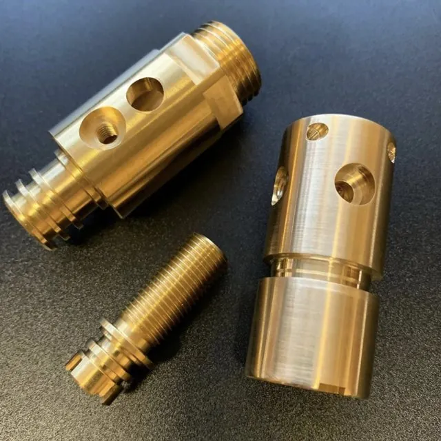 Brass turned fittings with cross-drilled body